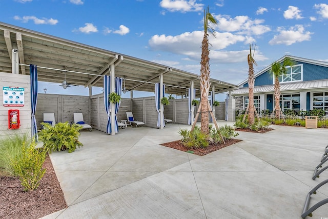 view of parking with fence