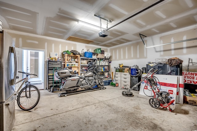 garage featuring a garage door opener