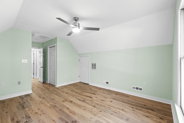 additional living space with ceiling fan, light hardwood / wood-style floors, and lofted ceiling