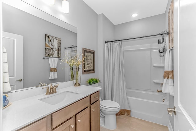 full bathroom featuring tile patterned flooring, toilet, shower / bathtub combination with curtain, and vanity