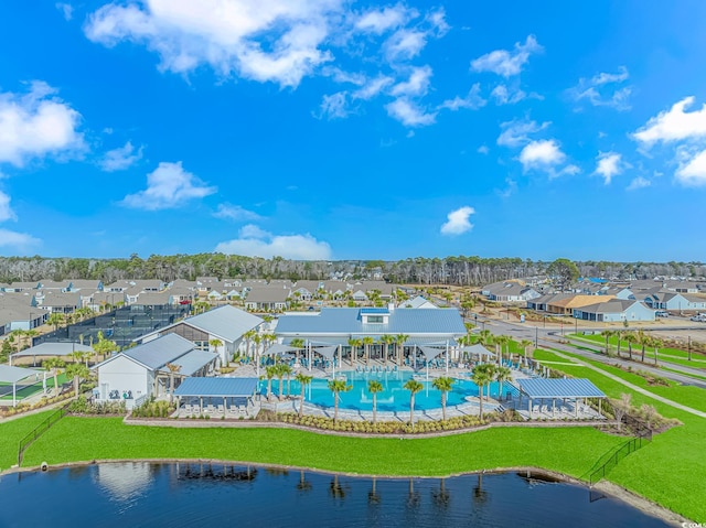 bird's eye view featuring a water view and a residential view