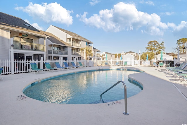 view of swimming pool featuring a patio