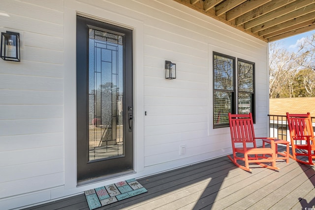 property entrance featuring covered porch