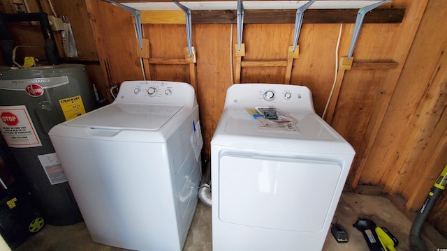 90 Wateree Trl, Georgetown, SC 29440 - clothes washing area with water heater, washer and clothes dryer, and laundry area