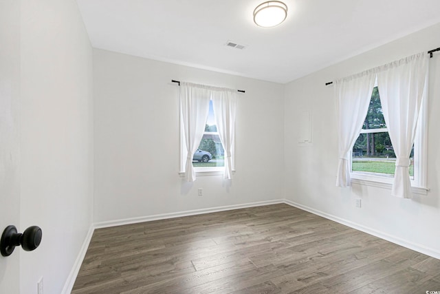 90 Wateree Trl, Georgetown, SC 29440 - spare room with visible vents, baseboards, plenty of natural light, and wood finished floors