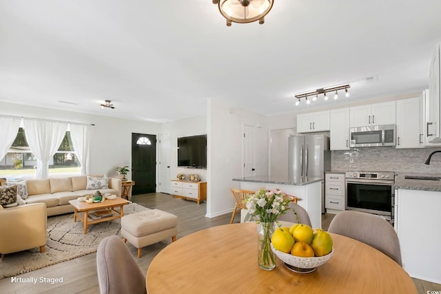 90 Wateree Trl, Georgetown, SC 29440 - dining area featuring light wood-type flooring and baseboards