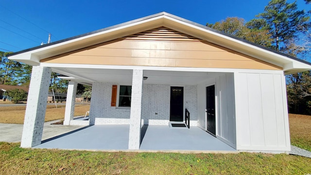 rear view of property with a patio area