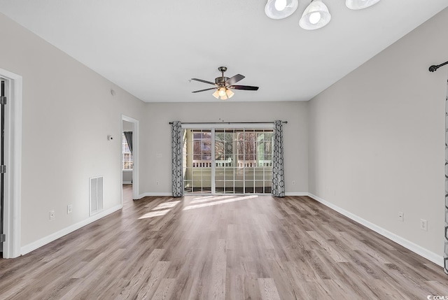 unfurnished living room featuring light hardwood / wood-style flooring and ceiling fan