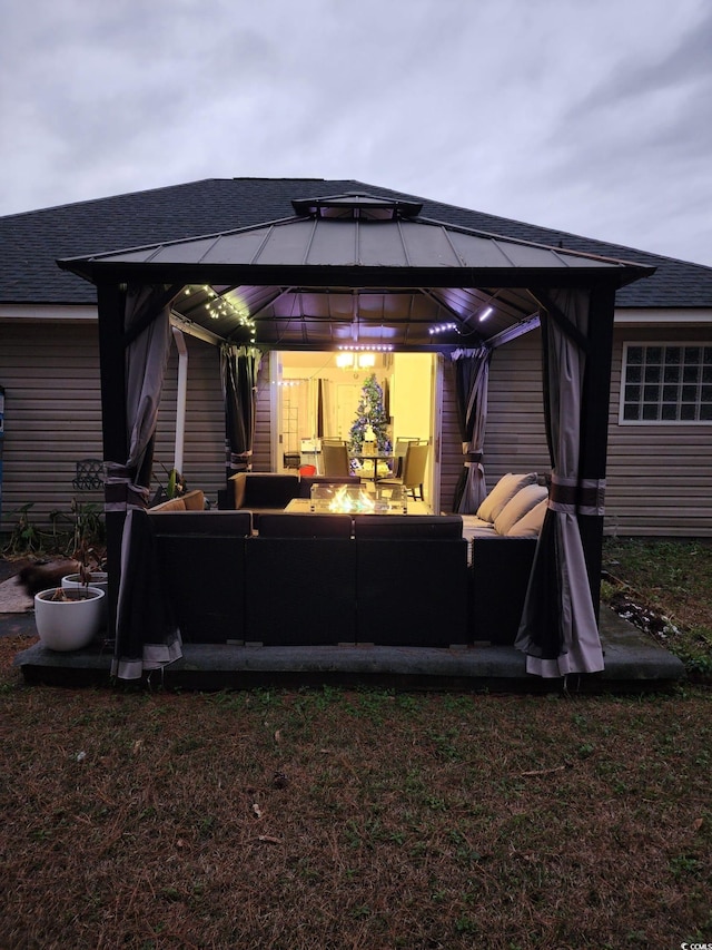 view of patio / terrace featuring outdoor lounge area and a gazebo