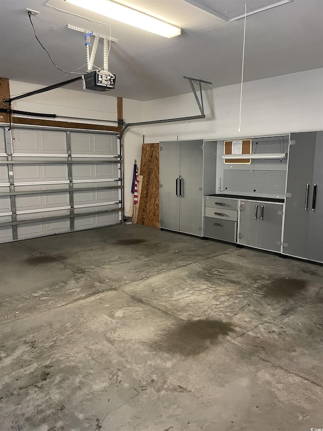 garage featuring a garage door opener