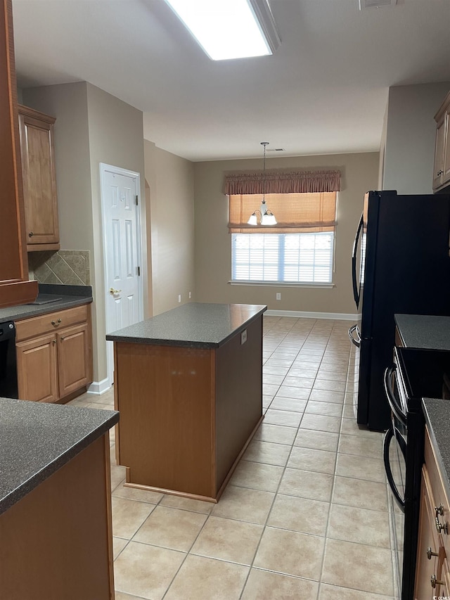 kitchen with refrigerator, tasteful backsplash, stainless steel range with electric stovetop, a center island, and light tile patterned flooring