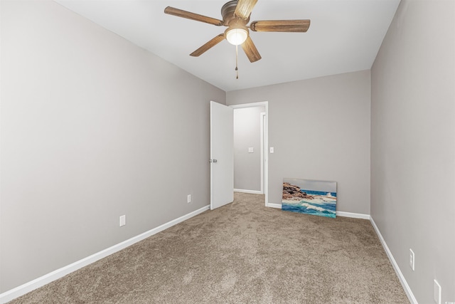 clothes washing area with washing machine and clothes dryer and light carpet