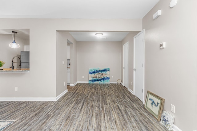 spare room featuring hardwood / wood-style floors