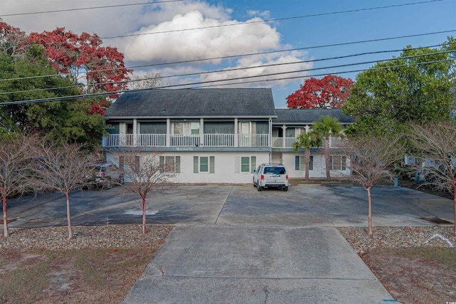 front of property featuring a balcony