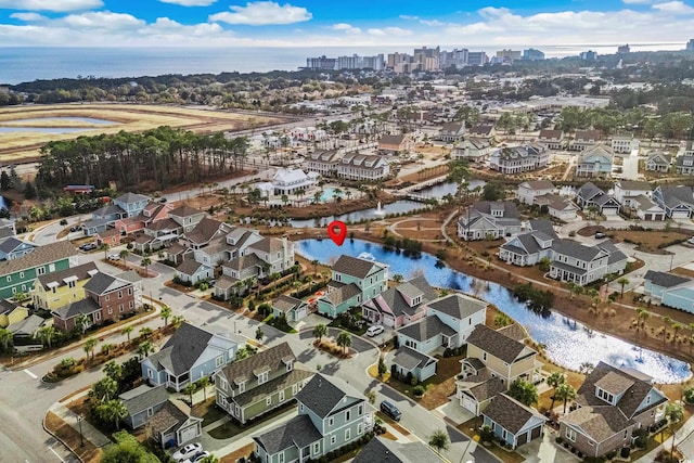 bird's eye view with a water view