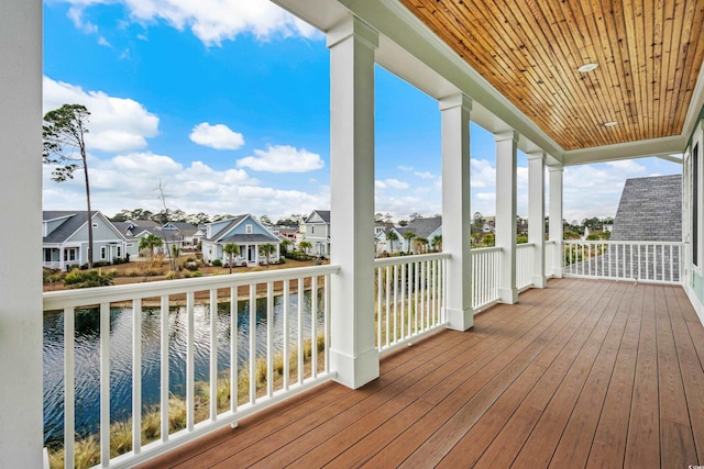 deck featuring a water view