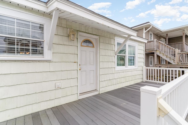 entrance to property with a wooden deck