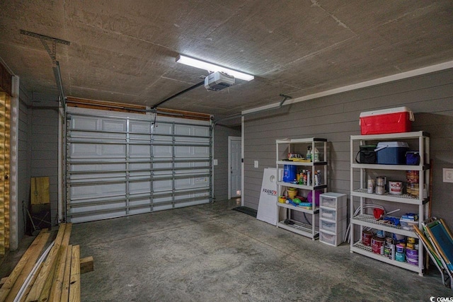 garage featuring a garage door opener