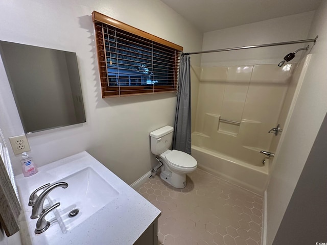 full bathroom with tile patterned floors, vanity, toilet, and shower / tub combo with curtain