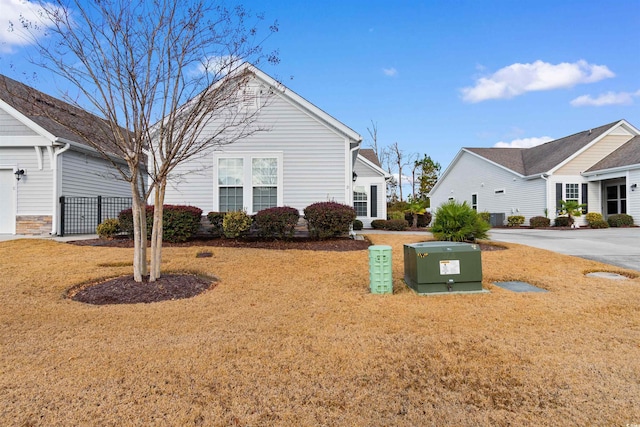 view of home's exterior with a lawn