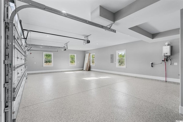 garage featuring a garage door opener, electric panel, and tankless water heater