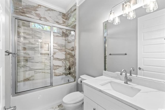 full bathroom with combined bath / shower with glass door, vanity, toilet, and crown molding