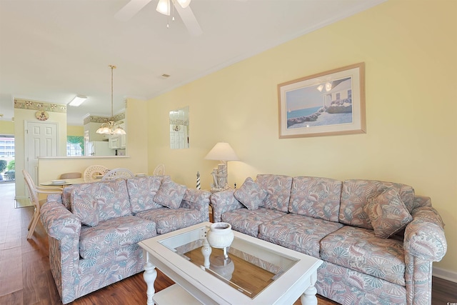 4240 Coquina Harbour Dr Unit E-4, Little River, SC 29566 - living area featuring baseboards, ceiling fan, wood finished floors, and ornamental molding