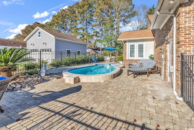 view of pool featuring a patio