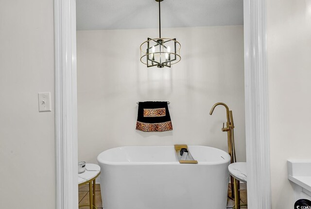 bathroom with tile patterned floors, vanity, and toilet