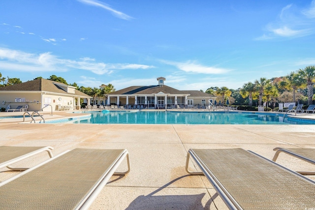 view of pool featuring a patio area