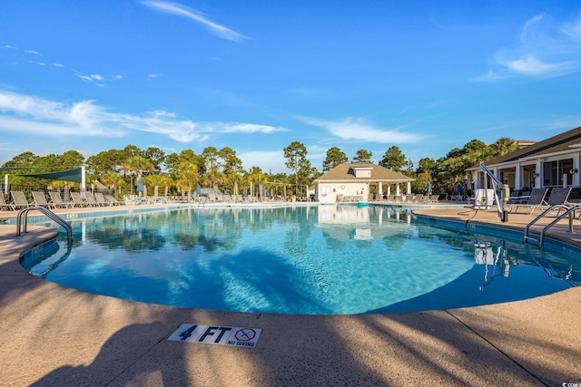 view of pool with a patio area