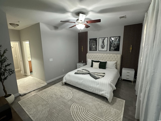 bedroom featuring ensuite bathroom and ceiling fan