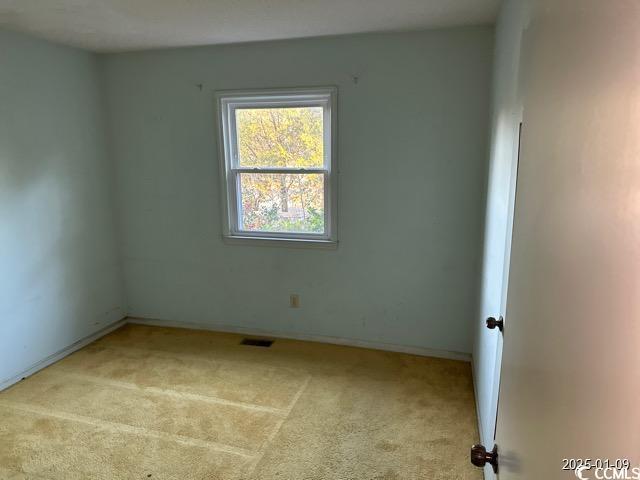 empty room with light carpet