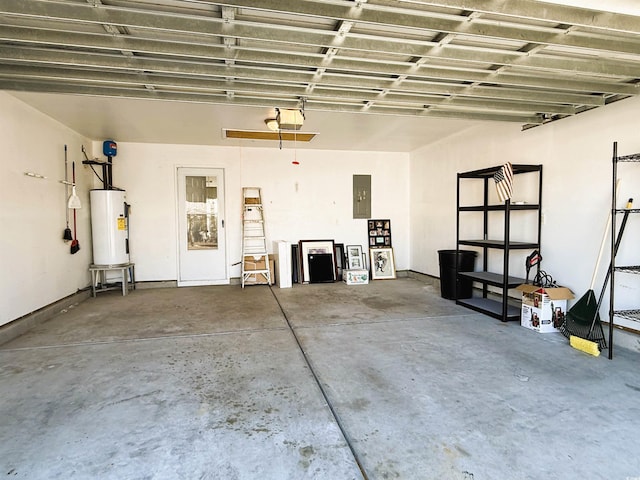 garage featuring electric panel, a garage door opener, and gas water heater