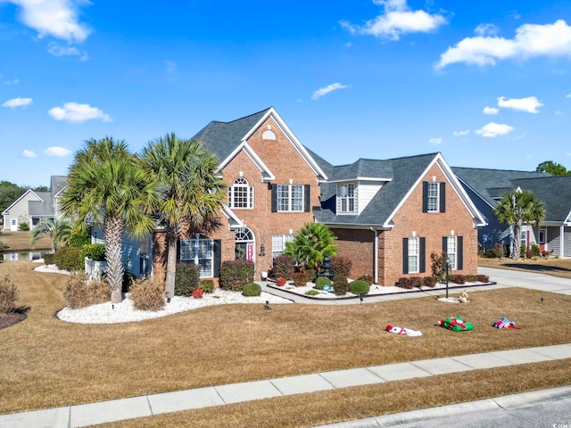 view of front of home featuring a front lawn