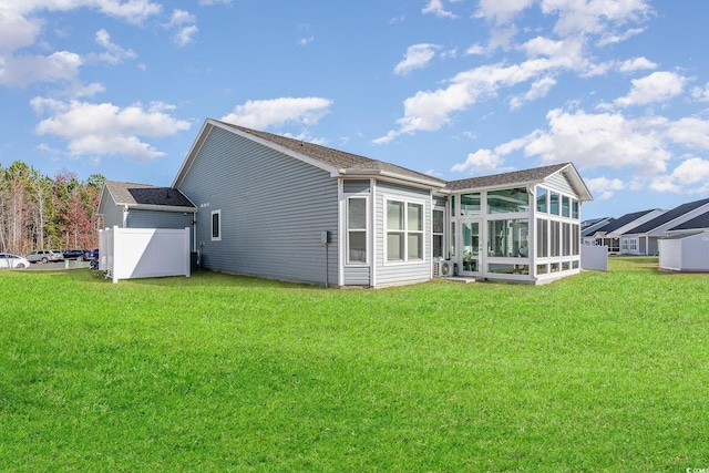 5037 Sassari St, Myrtle Beach, SC 29579 - back of house with a sunroom and a yard