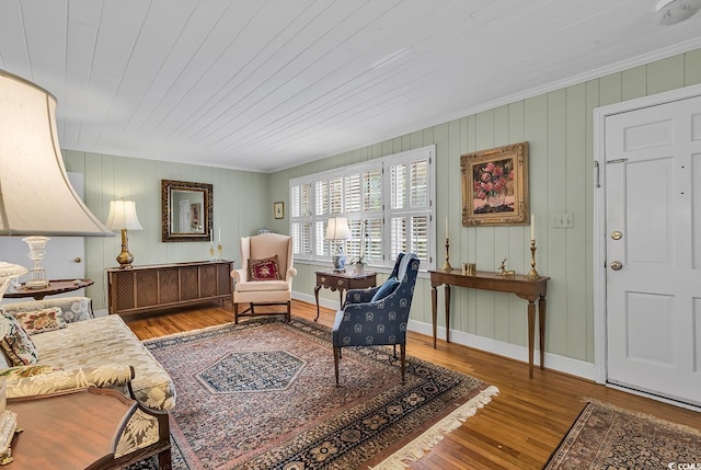 living area with hardwood / wood-style flooring and wood ceiling