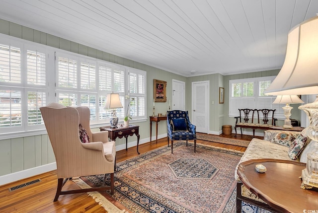 interior space featuring wood-type flooring, plenty of natural light, and wood ceiling