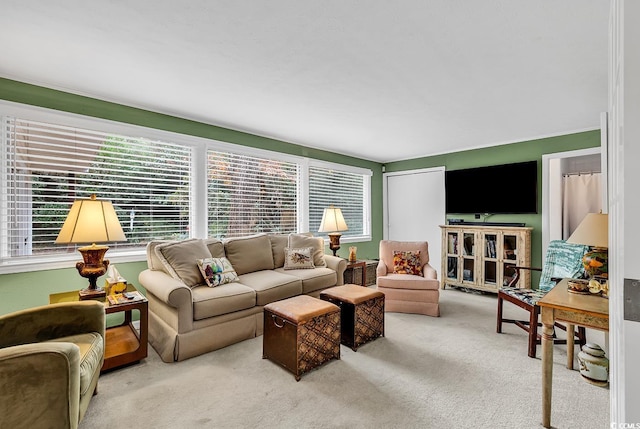 living room featuring light carpet