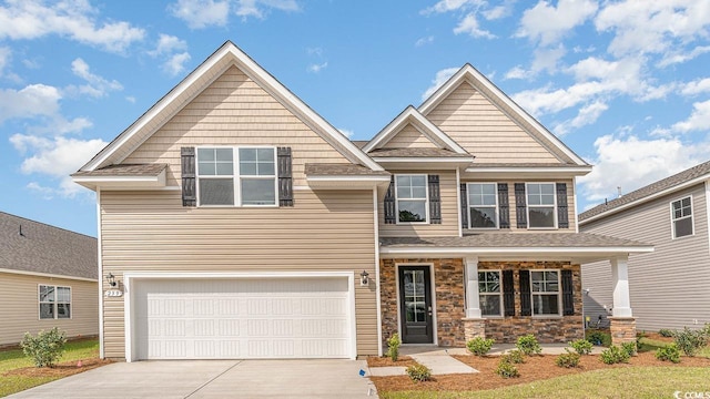 craftsman-style home with a garage