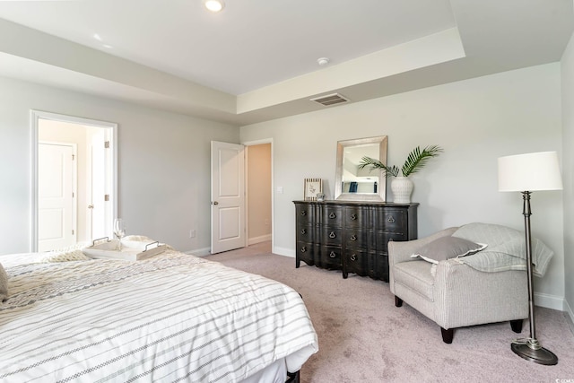 bedroom with light colored carpet