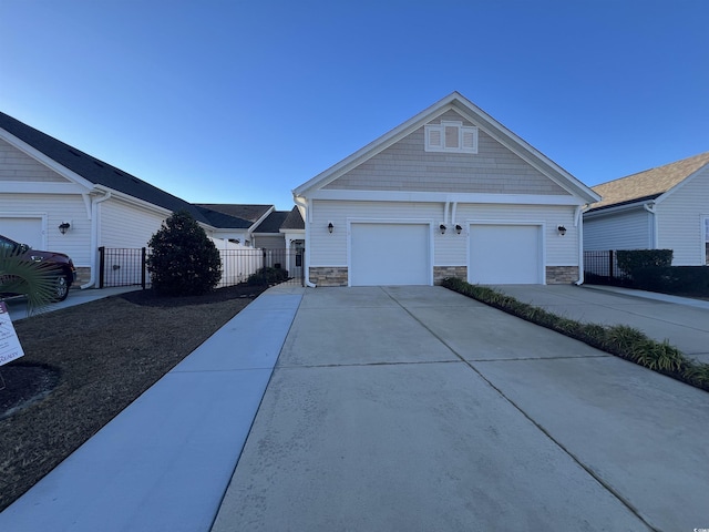 view of side of home featuring a garage