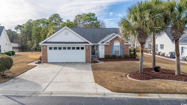 ranch-style home featuring a front lawn and a garage