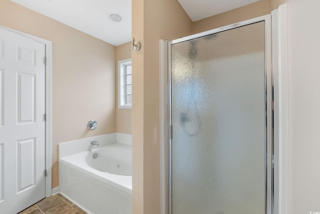 bathroom featuring separate shower and tub and tile patterned floors