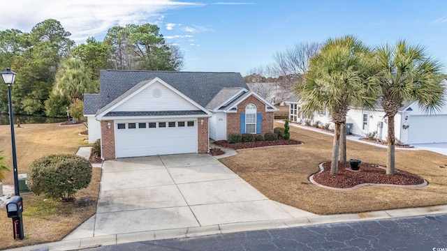 single story home with a front lawn and a garage