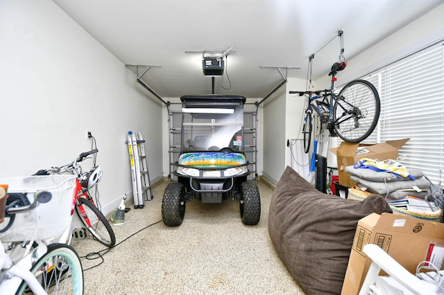 garage featuring a garage door opener