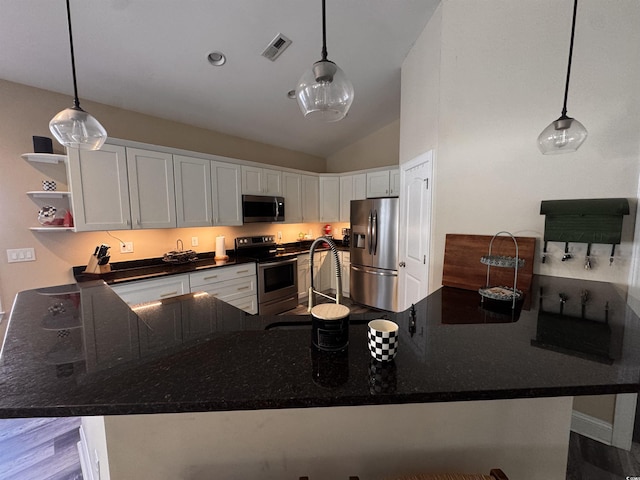 kitchen featuring appliances with stainless steel finishes, white cabinets, visible vents, and open shelves