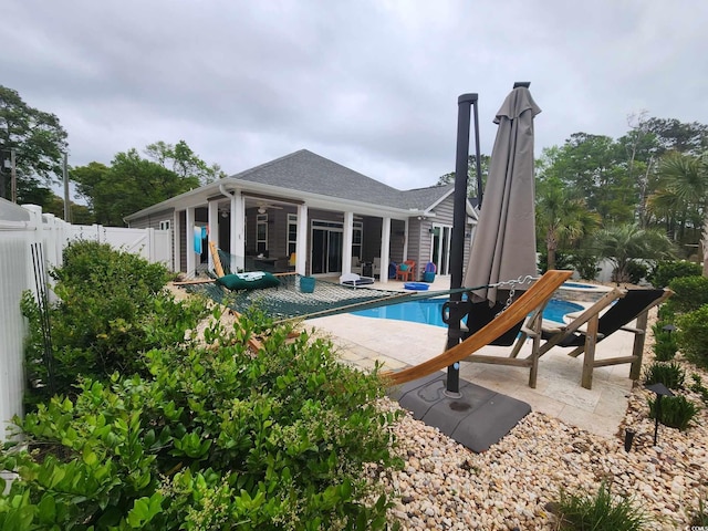 view of pool with a fenced in pool, a fenced backyard, and a patio