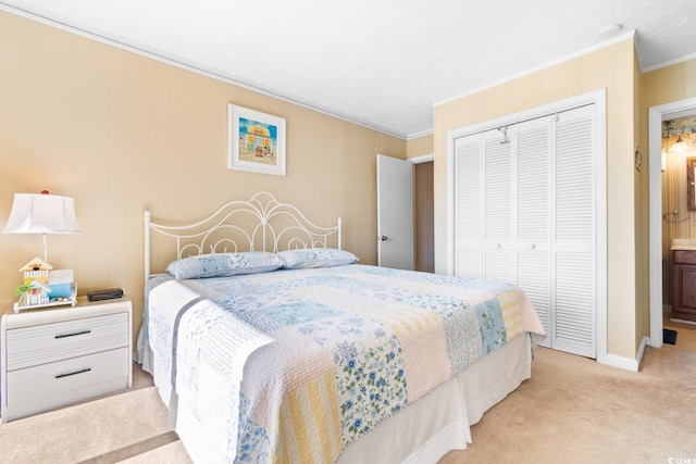 carpeted bedroom with a closet and ornamental molding