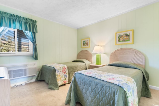 carpeted bedroom featuring a textured ceiling